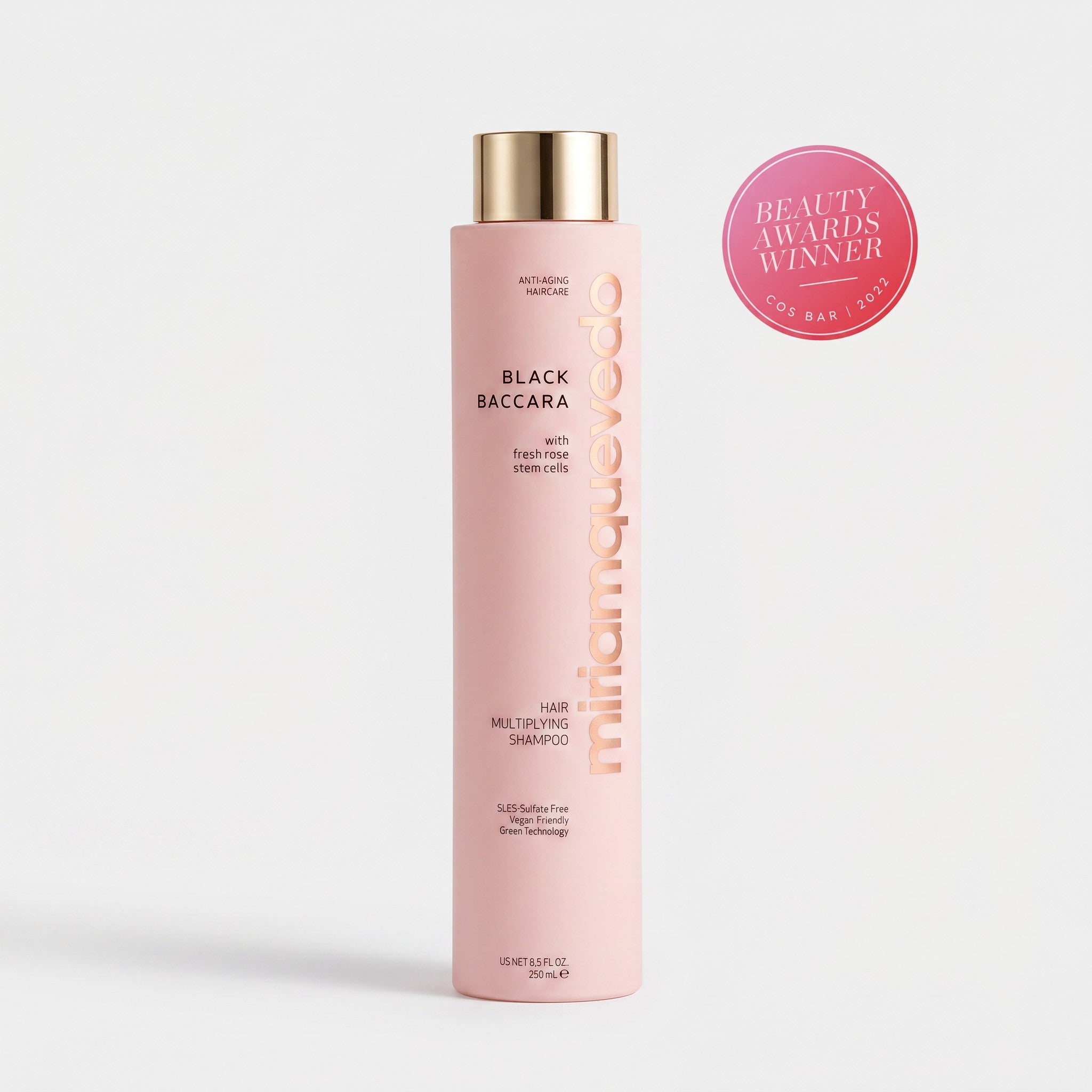 Shop Rescue Spa Black Baccara Hair Multiplying Shampoo in a tall matte pink bottle with a gold cap and award sticker.
