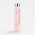 Shop Rescue Spa Black Baccara Hair Multiplying Shampoo in a tall, pale pink bottle with a metallic rose gold cap.
