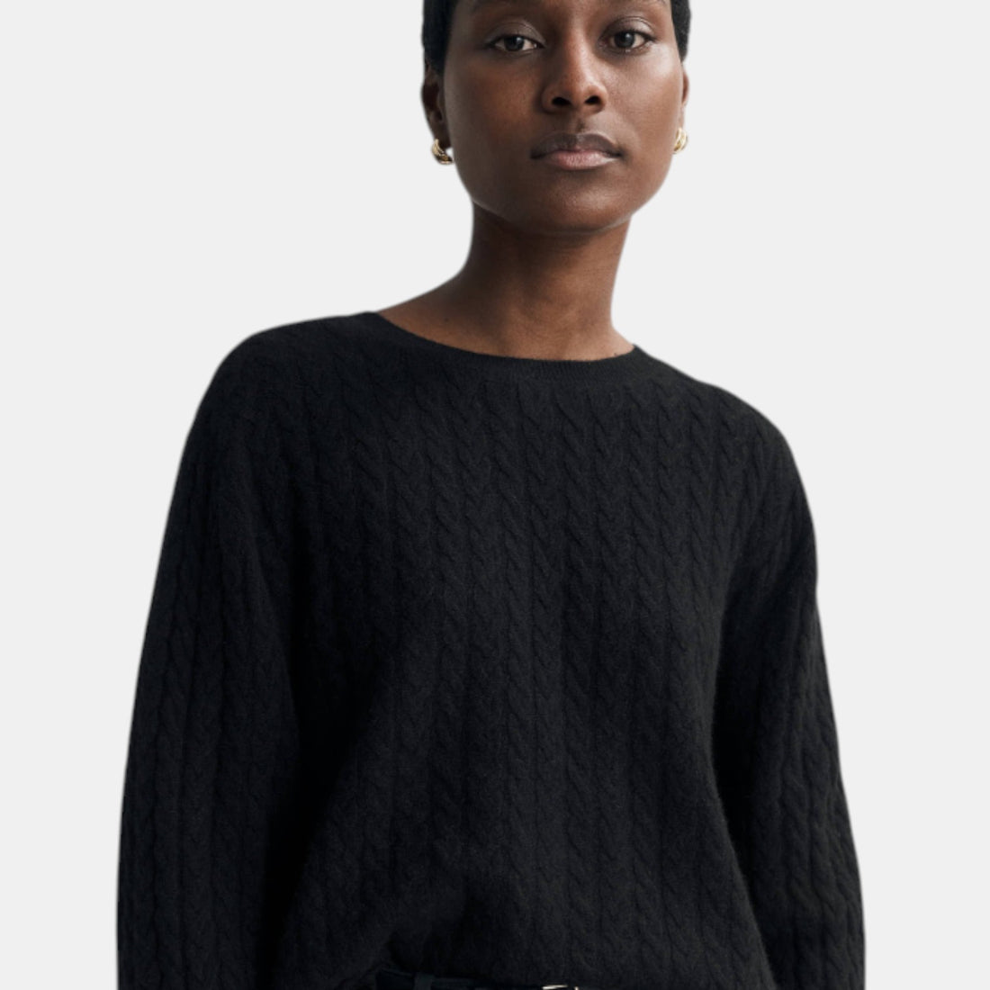 Shop Rescue Spa black oversized cable knit sweater in soft 100% cashmere with a relaxed fit.