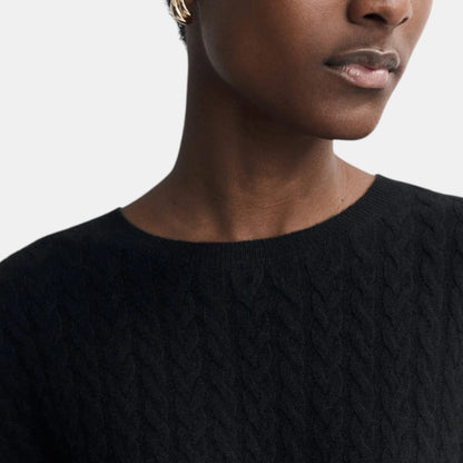 Shop Rescue Spa black oversized cable knit sweater in soft 100% cashmere with a relaxed fit and crew neckline
