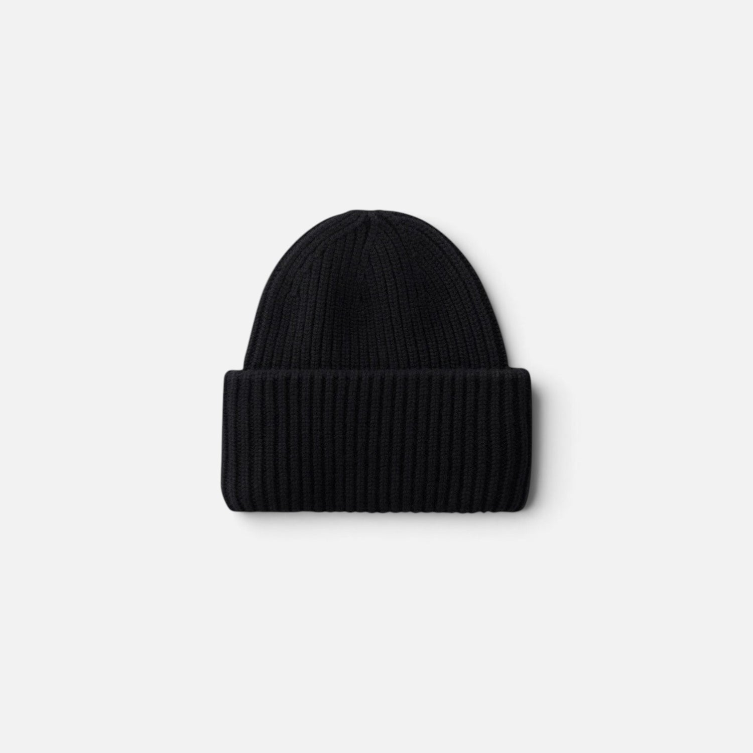 Shop Rescue Spa black ribbed knit cashmere beanie with a cuffed design, suitable for all genders.