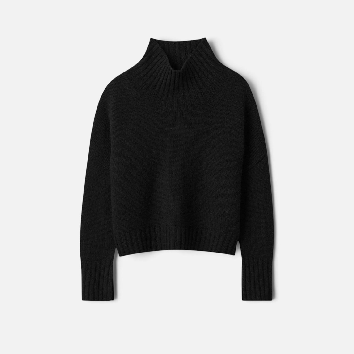 Shop Rescue Spa black chunky knit cashmere turtleneck sweater with sleeve slits in a relaxed fit