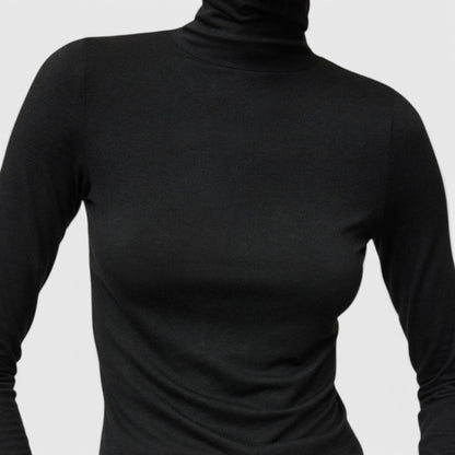Shop Rescue Spa lightweight black jersey turtleneck made from a soft Tencel and cashmere blend.