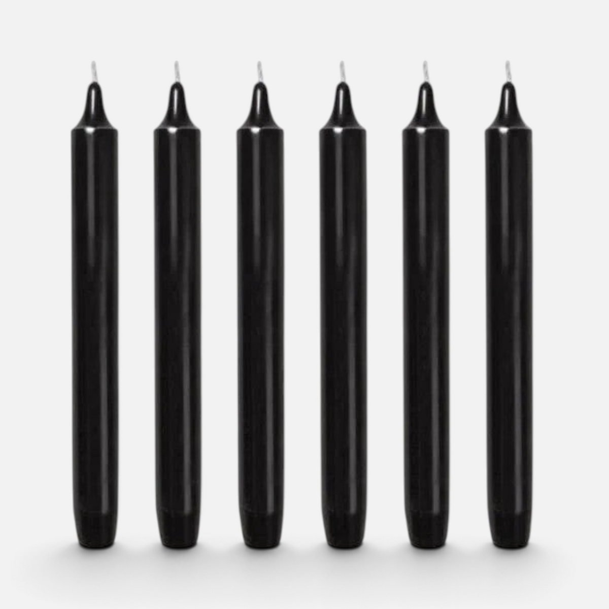 Shop Rescue Spa Black Madeleine taper candles, 8" H x 0.9" Ø, dripless and smokeless, 7-hour burn time.