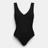 Shop Rescue Spa black one-piece swimsuit with V-neckline, underbust seam, shirring, and broad straps.
