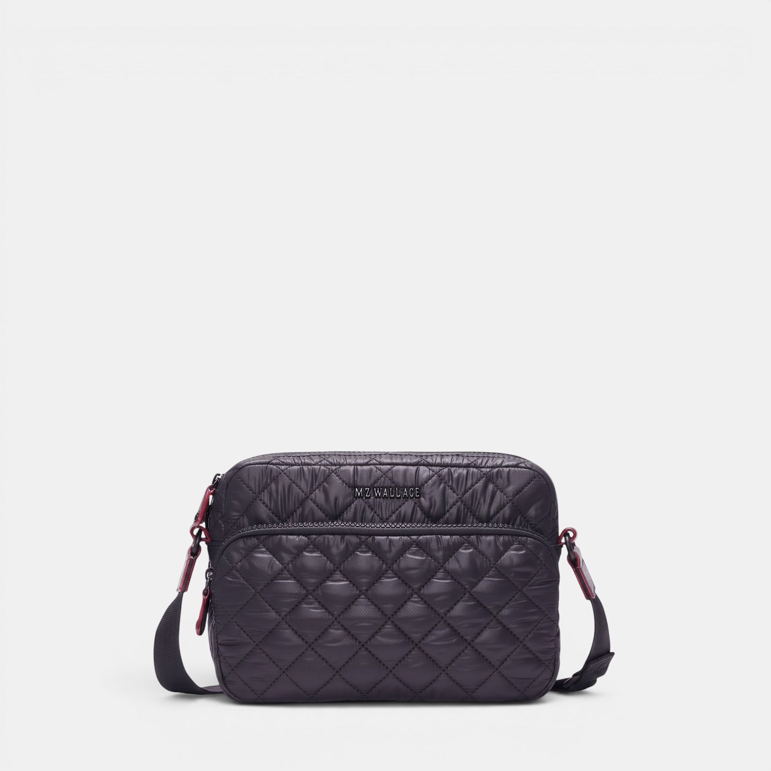 Shop Rescue Spa MZ Wallace black quilted nylon camera crossbody bag with leather trim and adjustable strap.