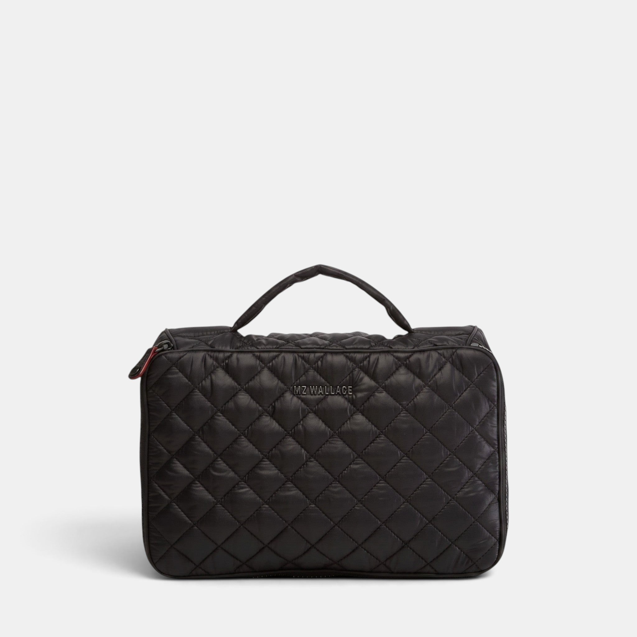 Shop Rescue Spa black quilted Zip Round Organizer with a top handle and wraparound zip closure for travel storage.