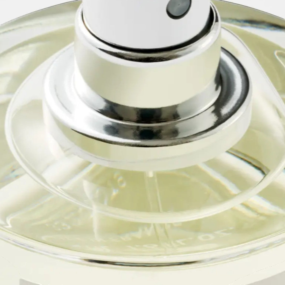 Shop Rescue Spa Black Saffron Eau De Parfum, a clear liquid in a glass bottle with a silver spray nozzle.