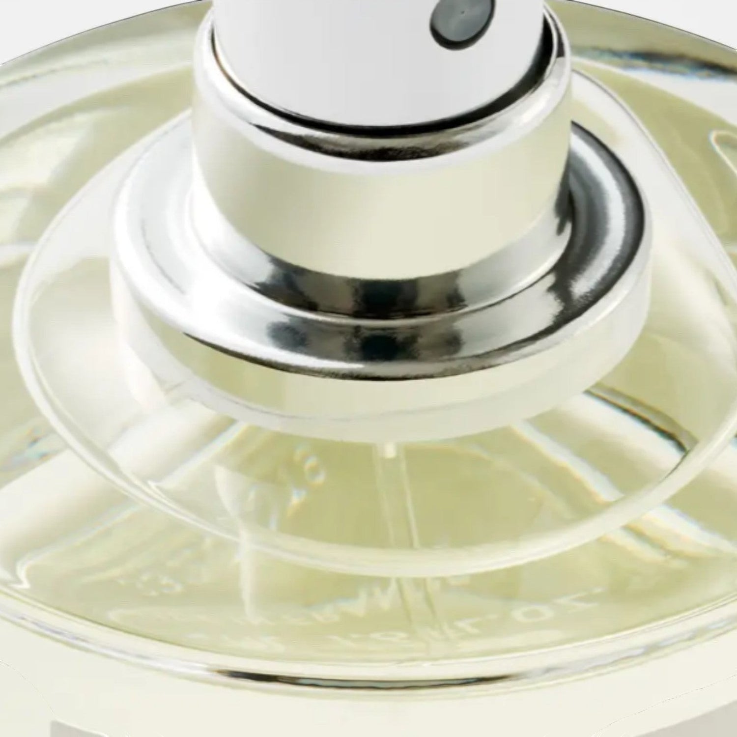 Shop Rescue Spa Black Saffron Eau De Parfum, a clear liquid in a glass bottle with a silver spray nozzle.