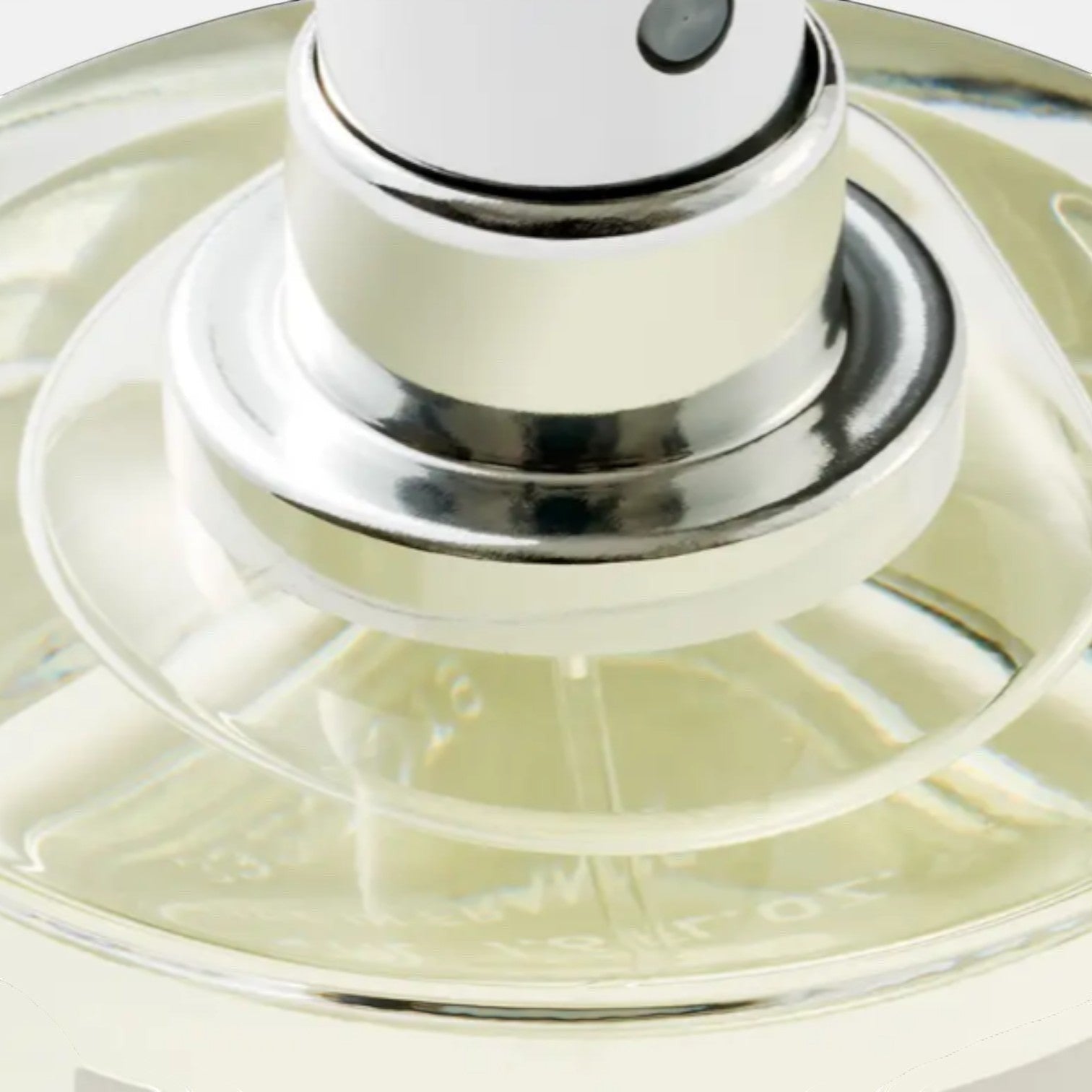 Shop Rescue Spa Black Saffron Eau De Parfum, a clear liquid in a glass bottle with a silver spray nozzle.