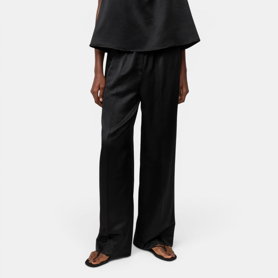 Shop Rescue Spa black woven silk blend straight leg pants with elastic waist.