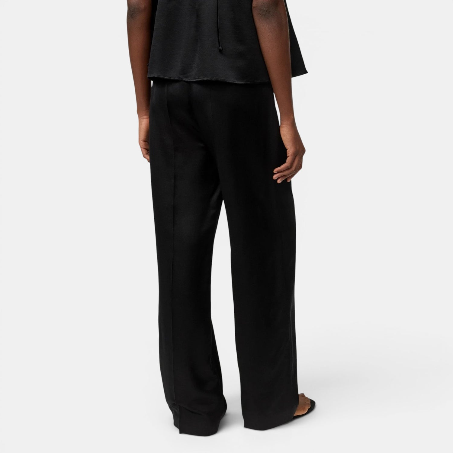 Shop Rescue Spa black woven silk and wool blend straight leg pants with elastic waist.