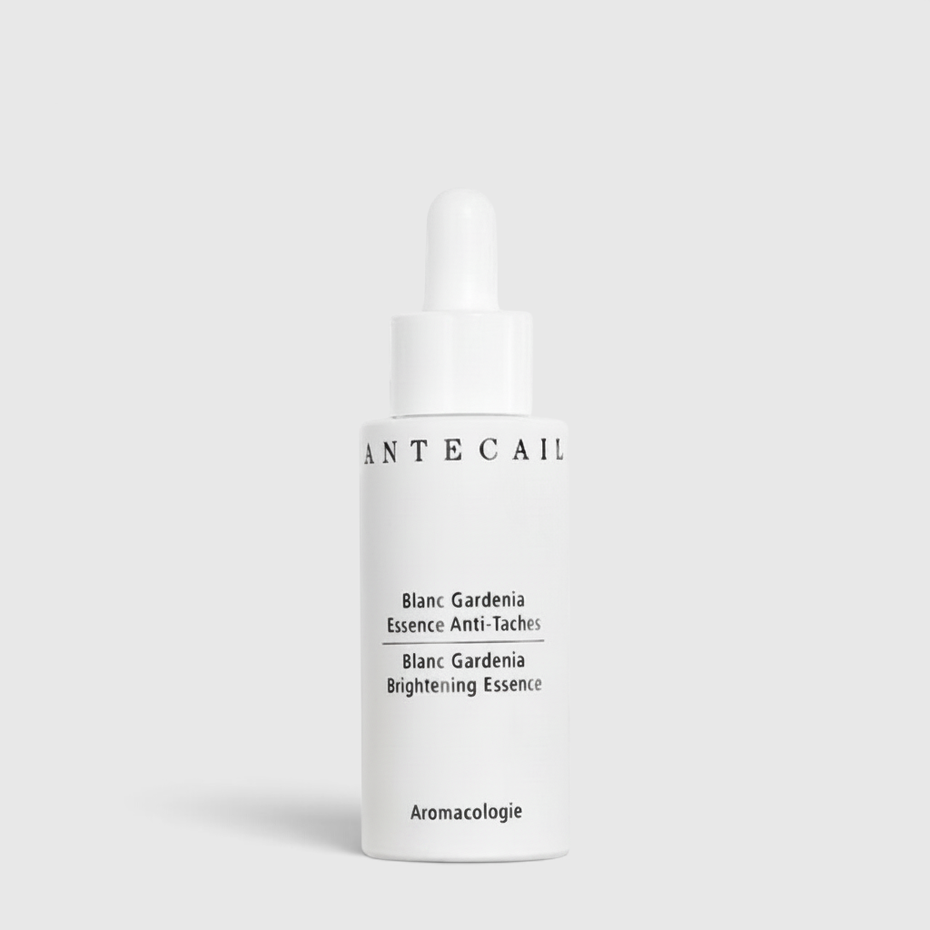 Shop Rescue Spa Blanc Gardenia Brightening Essence in a white 30ml dropper bottle for dark spot reduction.