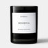 Shop Rescue Spa Bohemia scented candle in a black glass jar with a white label. Woody scent with notes of opoponax, rum, vanilla, sandalwood, and oak moss.