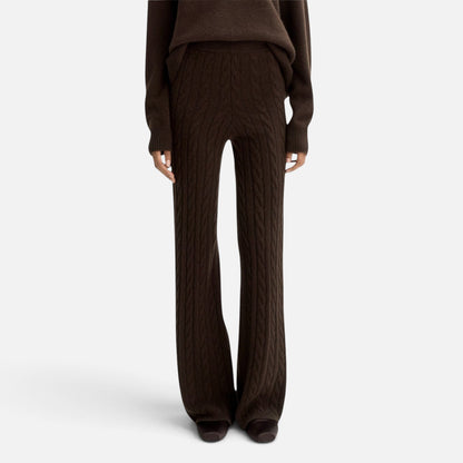 Shop Rescue Spa dark brown cable knit cashmere pants with an elastic waist and regular fit on a model