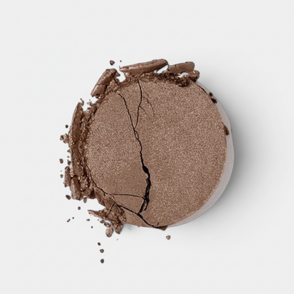 Shop Rescue Spa Mermaid Eye Matte eyeshadow in a rich brown shade with a velvety finish and cracked texture.