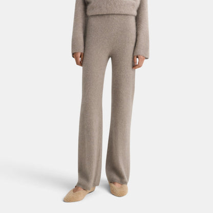 Shop Rescue Spa brushed beige cashmere knit pants with an elastic waist and regular fit worn by a model.