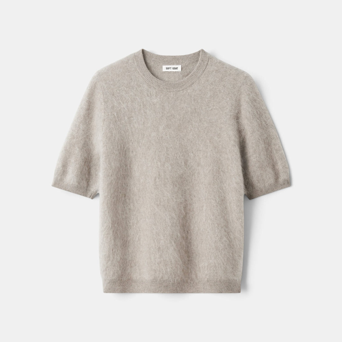 Shop Rescue Spa brushed beige cashmere short sleeve sweater with a regular fit and soft cuddle knit texture.