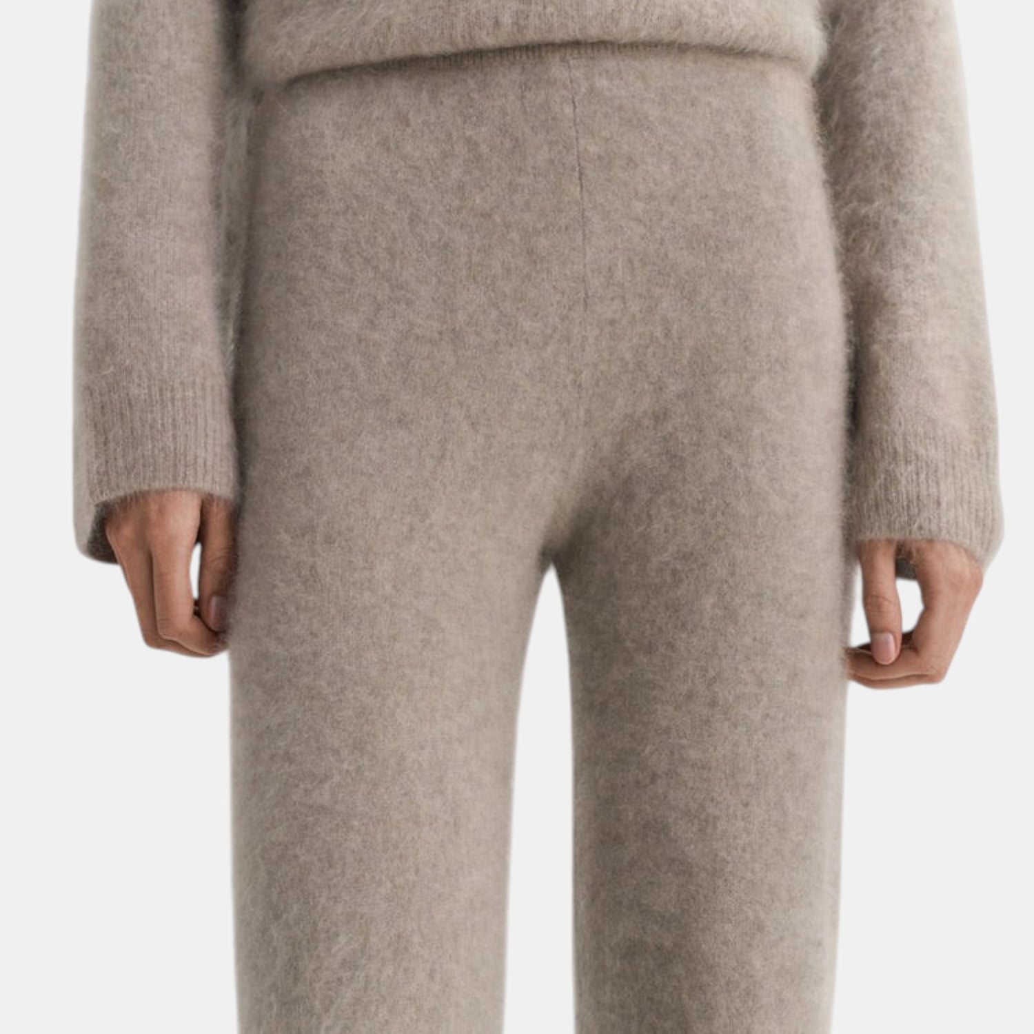 Shop Rescue Spa brushed beige cashmere knit pants with a comfortable elastic waist and regular fit.