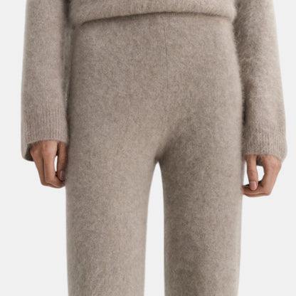 Shop Rescue Spa brushed beige cashmere knit pants with a comfortable elastic waist and regular fit.