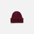 Shop Rescue Spa burgundy ribbed knit beanie made from 100% cashmere in a classic unisex cuffed style.