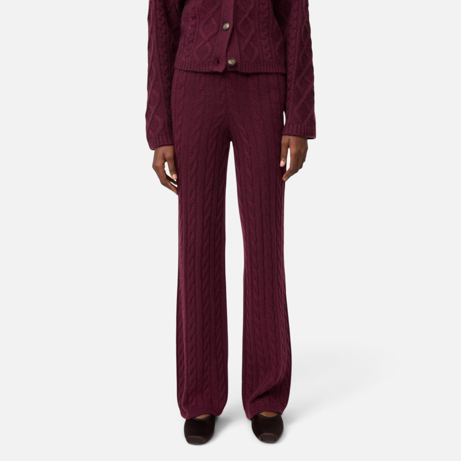 Shop Rescue Spa burgundy cable knit cashmere pants with an elastic waist worn by a model in a regular fit