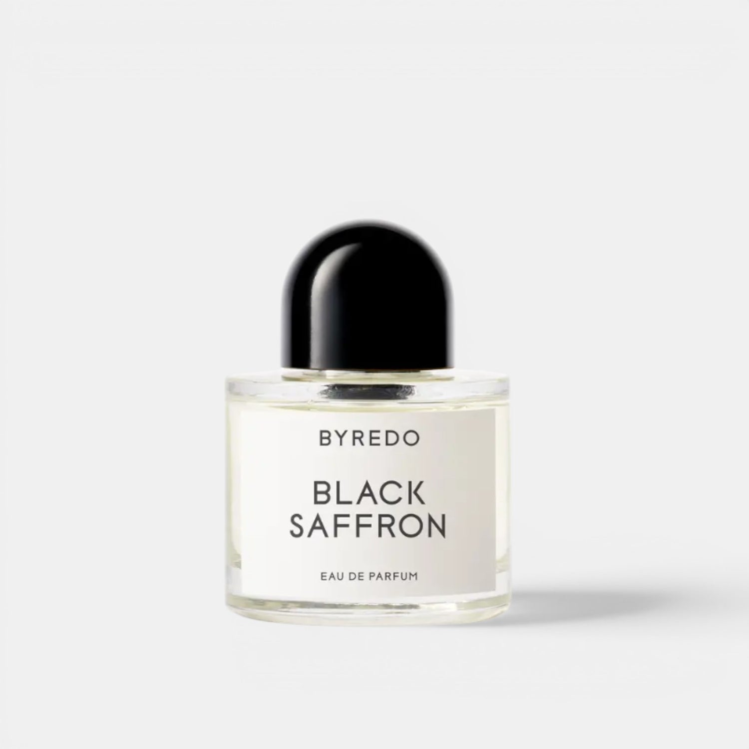Shop Rescue Spa BYREDO Black Saffron Eau De Parfum bottle with black cap. Notes of juniper, saffron, rose, raspberry.