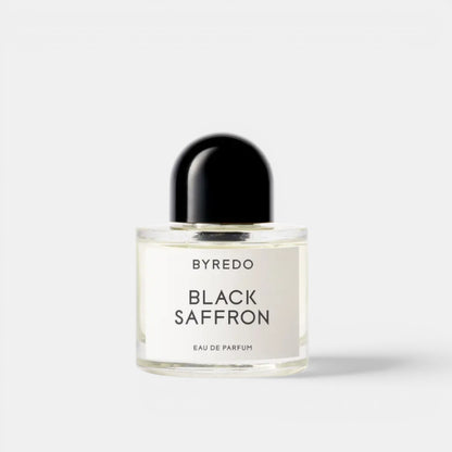 Shop Rescue Spa BYREDO Black Saffron Eau De Parfum bottle with black cap. Notes of juniper, saffron, rose, raspberry.