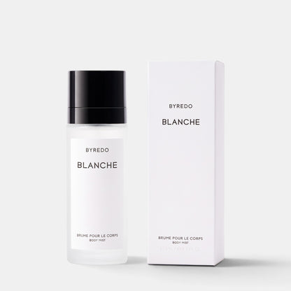 Shop Rescue Spa Byredo Blanche body mist in a frosted glass bottle with a black cap next to its white box packaging.