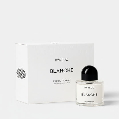 Shop Rescue Spa Byredo Blanche Eau de Parfum bottle and box. Notes of aldehyde, pink pepper, white rose, neroli, peony, violet, blonde woods, musk, and sandalwood.