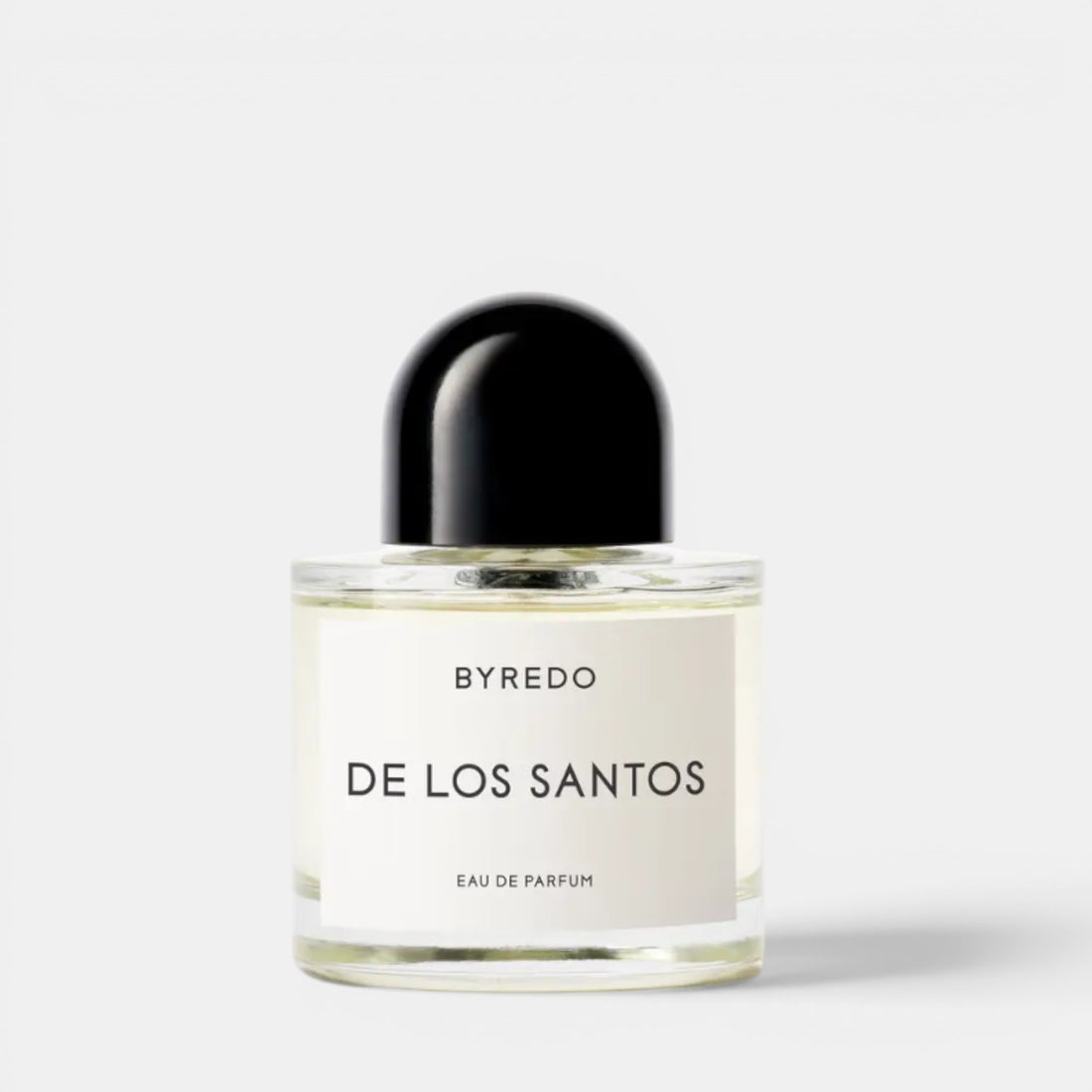Shop Rescue Spa BYREDO De Los Santos Eau de Parfum bottle with black cap. Aromatic musk, sage, amber, incense, iris root, mirabelle, cistus notes.