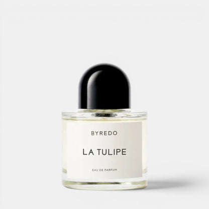 Shop Rescue Spa BYREDO La Tulipe Eau De Parfum bottle with a black cap. Notes of cyclamen, freesia, rhubarb, tulip, blonde woods, vetiver.