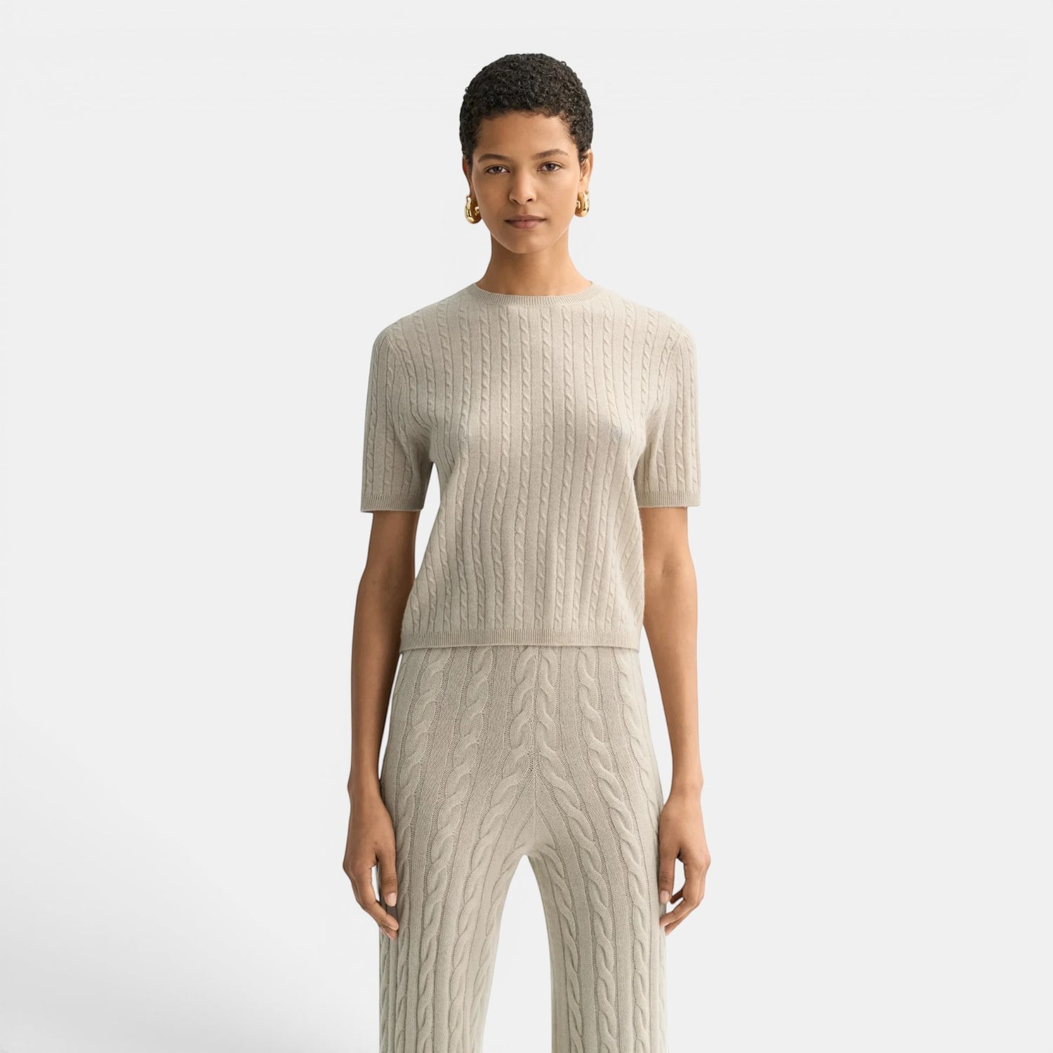 Shop Rescue Spa fitted short sleeve cable knit top in 100% cashmere, light beige.