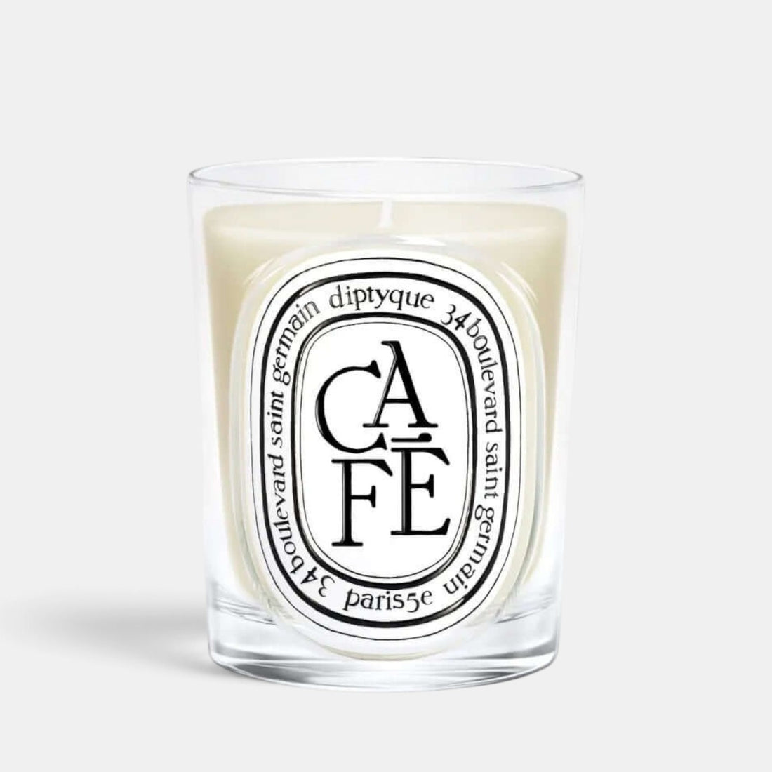 Shop Rescue Spa Cafe scented candle in a clear glass vessel with coffee and woody fragrance notes