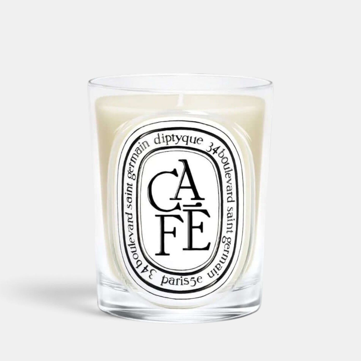 Shop Rescue Spa Cafe scented candle in a clear glass vessel with coffee and woody fragrance notes