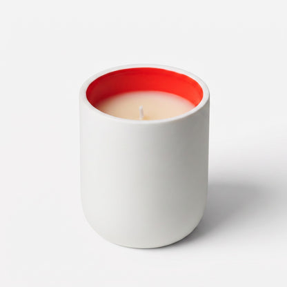 Shop Rescue Spa Cafe Society scented candle in a white matt porcelain vessel with a vibrant red interior rim.