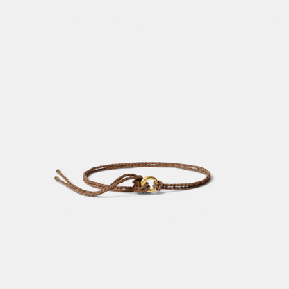 Shop Rescue Spa Salta belt in canyon brown braided suede and neoprene with a gold-tone metal ring detail