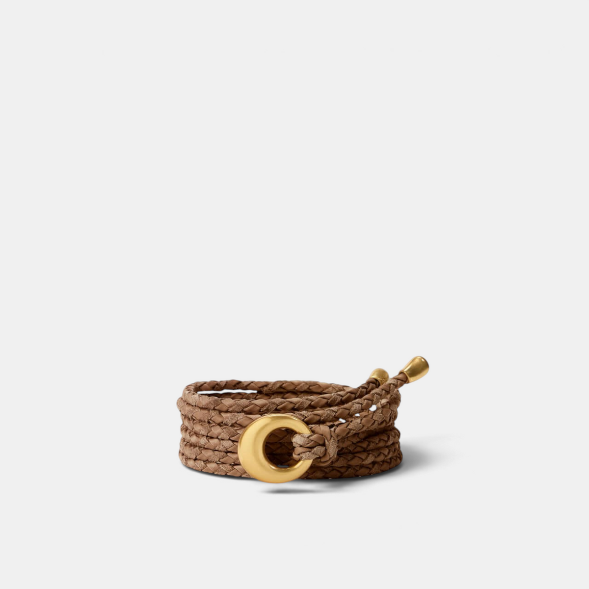 Shop Rescue Spa Salta belt in canyon brown braided suede and neoprene with a gold-toned circular buckle