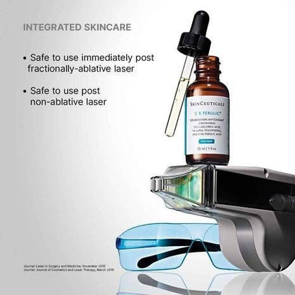 Shop Rescue Spa C E Ferulic vitamin C serum bottle with dropper resting on a laser treatment device