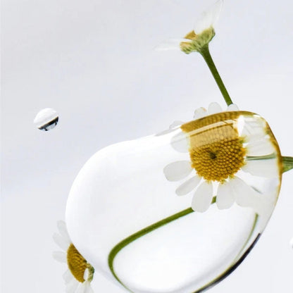 Shop Rescue Spa Danucera Cerabalm multi-purpose cleansing balm texture with chamomile flowers in a clear drop