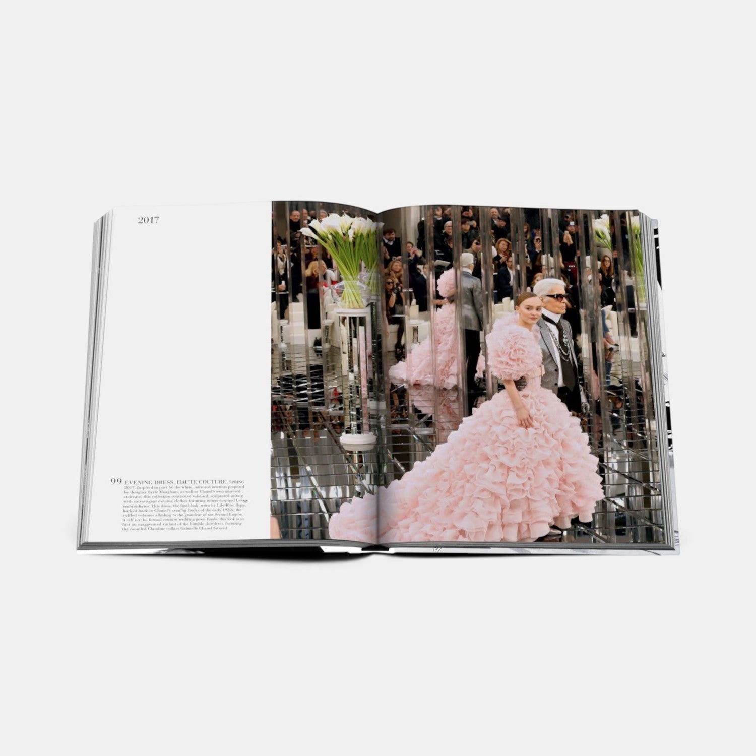 Shop Rescue Spa Chanel The Legend of an Icon book open to a page showing a pink ruffled couture gown on a runway