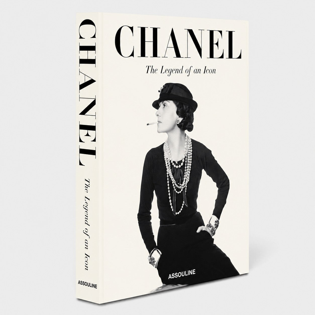 Shop Rescue Spa Chanel The Legend of an Icon hardcover book featuring a black and white portrait of Gabrielle Chanel