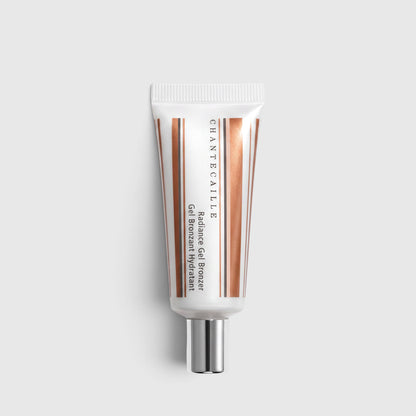 Shop Rescue Spa Chantecaille Radiance Gel Bronzer in a white squeeze tube with metallic bronze accents