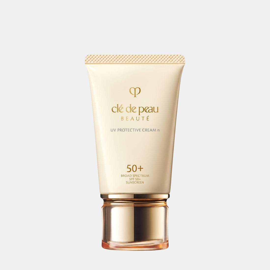 Shop Rescue Spa Cle de Peau Beaute UV Protective Cream SPF 50+ in a beige tube with gold cap.