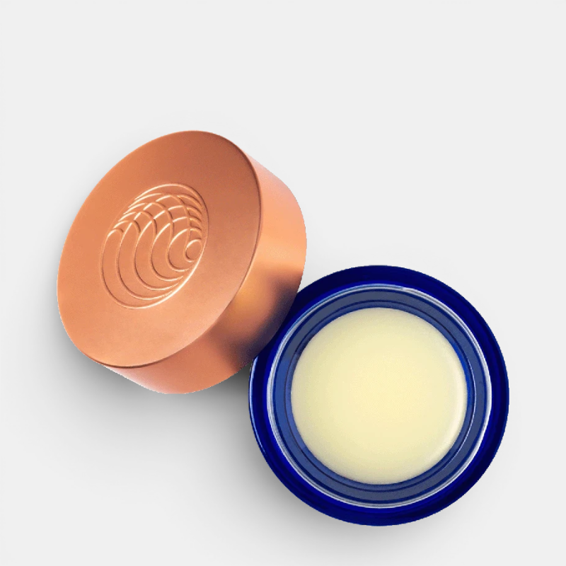 Shop Rescue Spa The Cleansing Balm in a blue glass jar with a metallic copper lid, shown from an overhead view.