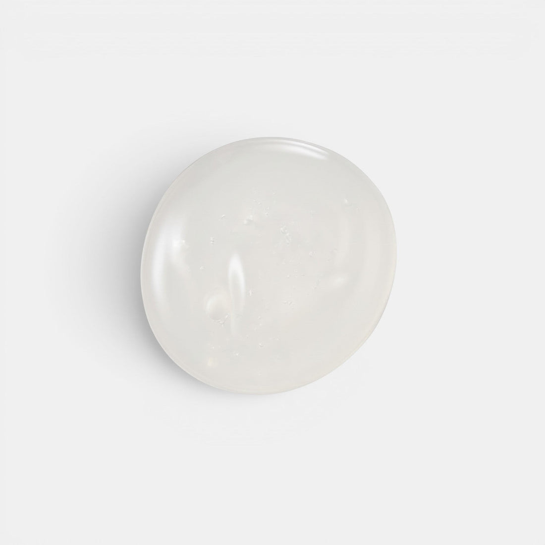 Shop Rescue Spa Scalp Booster Shampoo with a clear, gel-like texture isolated on a white background.