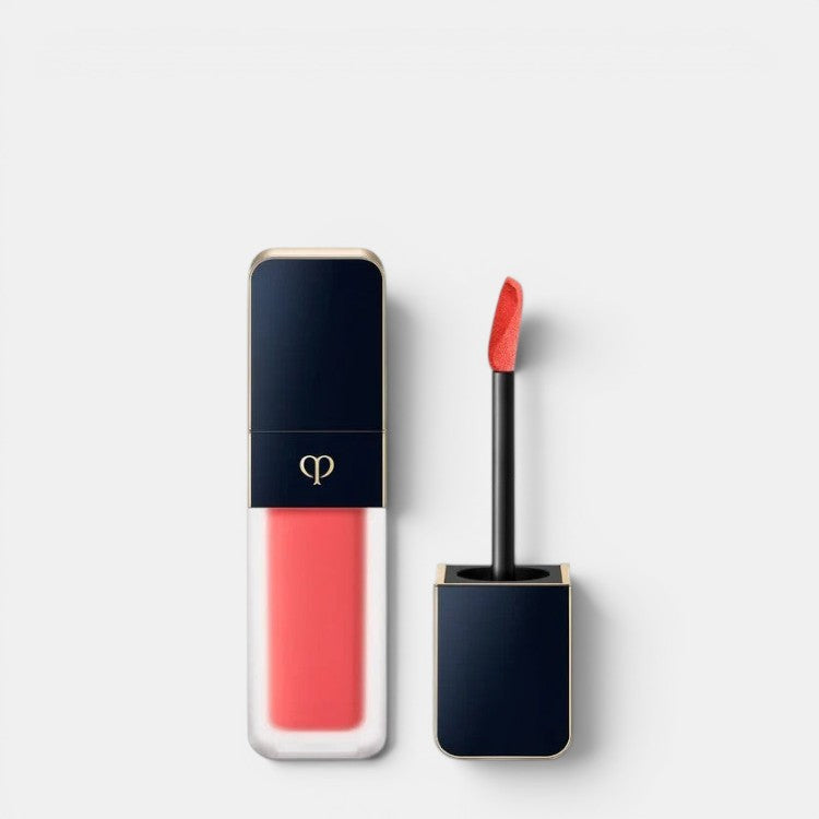 Shop Rescue Spa Cream Rouge Matte liquid lipstick in a coral shade with a matte finish. Features a navy cap and gold accent.