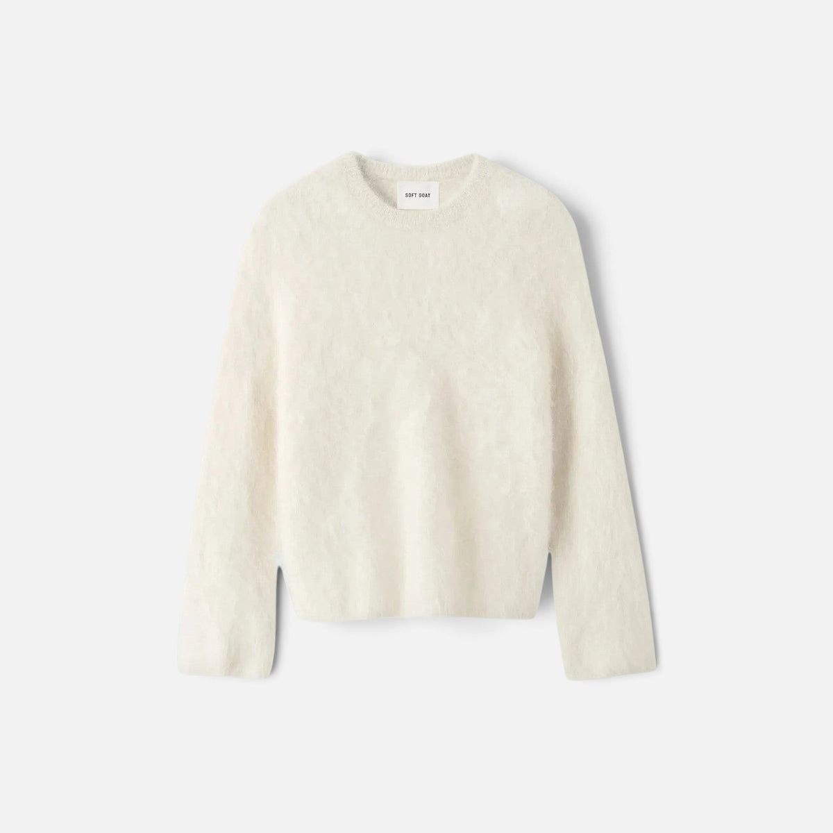 Shop Rescue Spa cream alpaca blend crewneck sweater with a relaxed fit and plain knit texture.