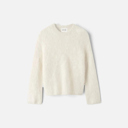 Shop Rescue Spa cream alpaca blend crewneck sweater with a relaxed fit and plain knit texture.