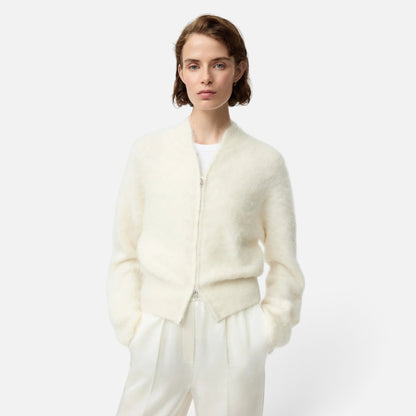 Shop Rescue Spa cream alpaca blend zip-up cardigan worn by a model in a slim fit style.